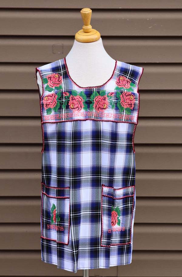 Blue large-plaid Mexican apron with colorful cross-stitch embroidery and front pockets