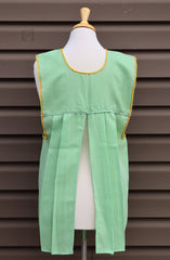 Back view of light green gingham Mexican apron showing the open-back design
