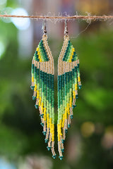 Green cascade fringe seed bead earrings handcrafted in Mexico.