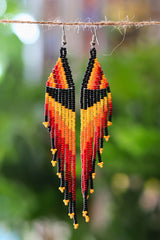 Orange cascade fringe seed bead earrings handcrafted in Mexico.