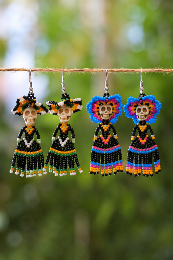Assorted Catrina seed bead earrings handcrafted in Mexico.