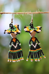 Back view of green Catrina seed bead earrings handcrafted in Mexico.