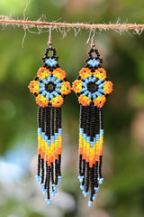 Orange flower fringe seed bead earrings handcrafted in Mexico.