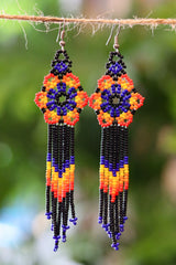 Red flower fringe seed bead earrings handcrafted in Mexico.