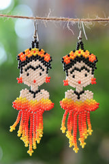 Orange Frida-inspired seed bead earrings handcrafted in Mexico.