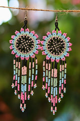 Pink sunburst seed bead earrings handcrafted in Mexico.