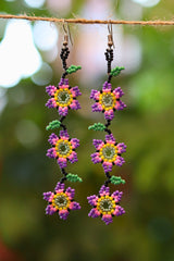 Purple three flowers seed bead earrings handcrafted in Mexico.