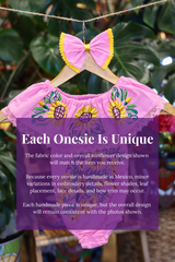 A pink baby bodysuit with sunflower embroidery, hanging on a wooden hanger with a matching white bow headband. The background features lush green houseplant leaves, and a large purple text box overlays the lower half with information about customization.