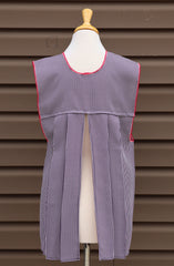 Back view of purple gingham Mexican apron showing the open-back design