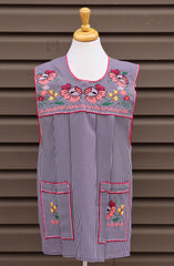 Purple gingham Mexican apron with colorful cross-stitch embroidery and front pockets