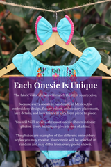 A turquoise baby bodysuit with colorful floral embroidery, hanging on a wooden hanger with a matching white bow headband. The background features lush green houseplant leaves, and a large purple text box overlays the lower half with information about customization.